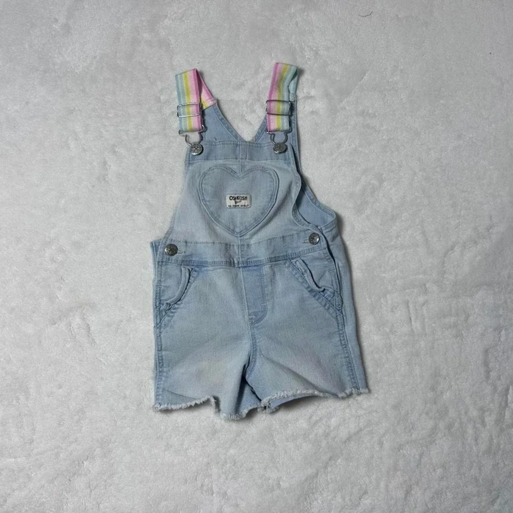 Blue denim shorts overalls with heart detail and rainbow straps. Size: 2 years‎